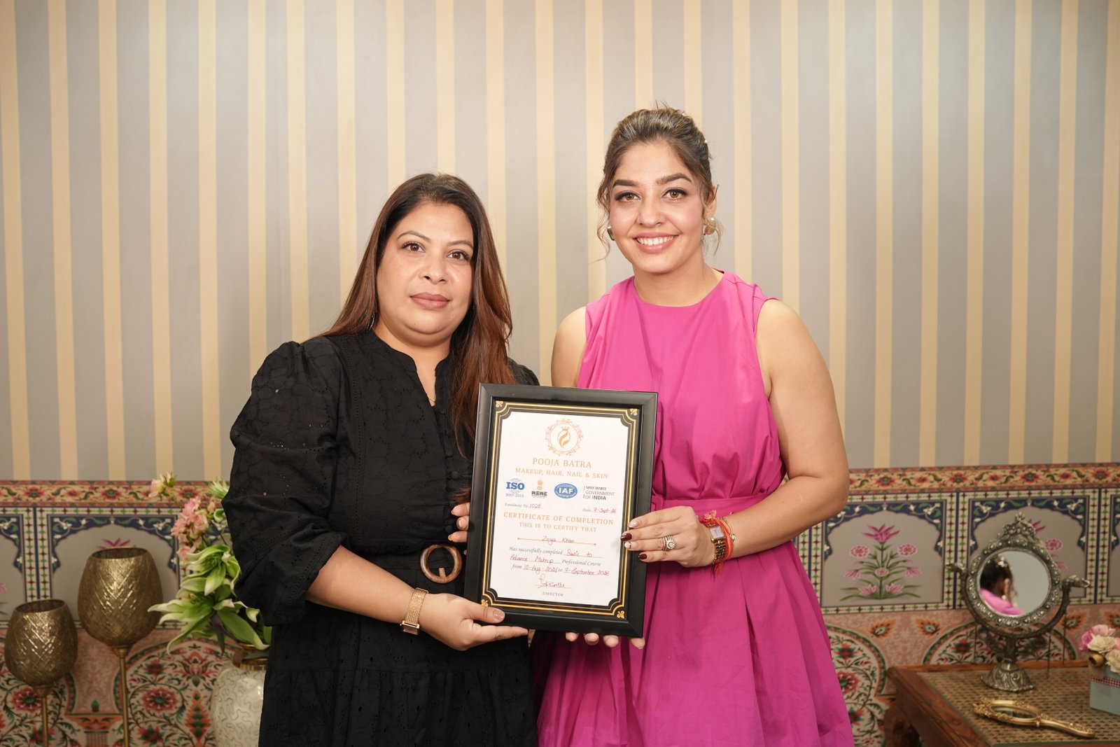 Graduate receiving a gift at the Academy ceremony